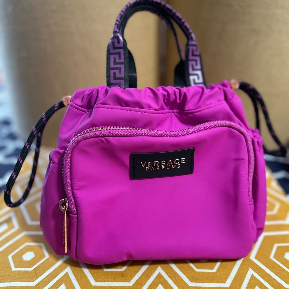 Versace perfume make up bag.